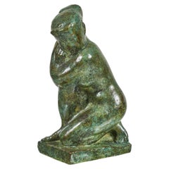 Scultura in bronzo patinato di una donna inginocchiata di Guy Charles Revol "1912-1991